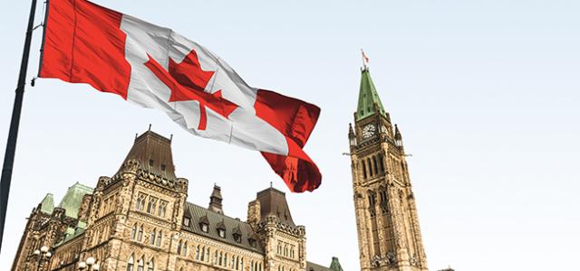 Canadian parliament with Canadian flag